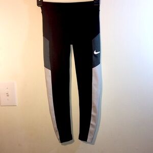Girl’s Nike 7/8ths Leggings. Black, Dark Grey, & Light Grey.